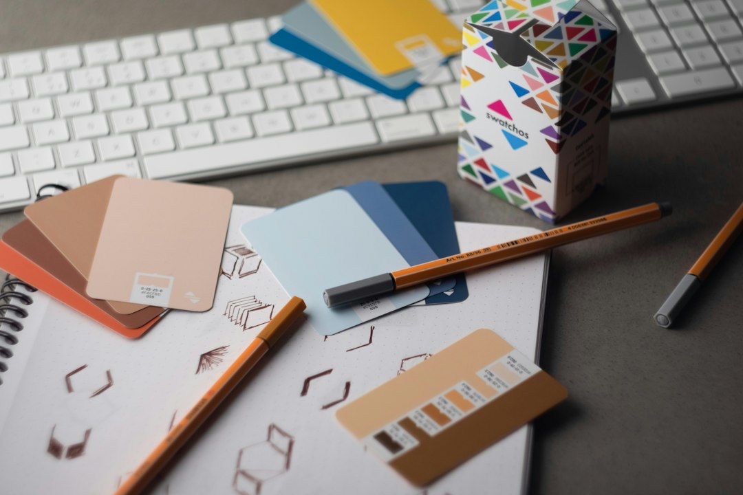 Brand color swatches on a designer's desk